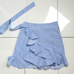 Blue floral wrap skirt.